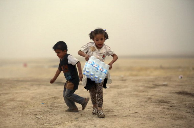 Игиловцы обучают детей рубить головы и делать бомбы