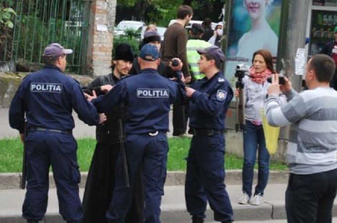 Believers disrupt LGBT march in Chisinau