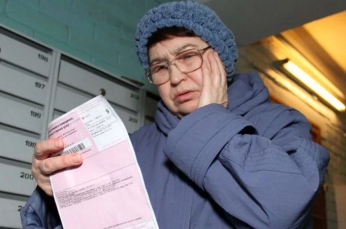 С платежками за коммуналку киевлянам прислали «молитву грешника»