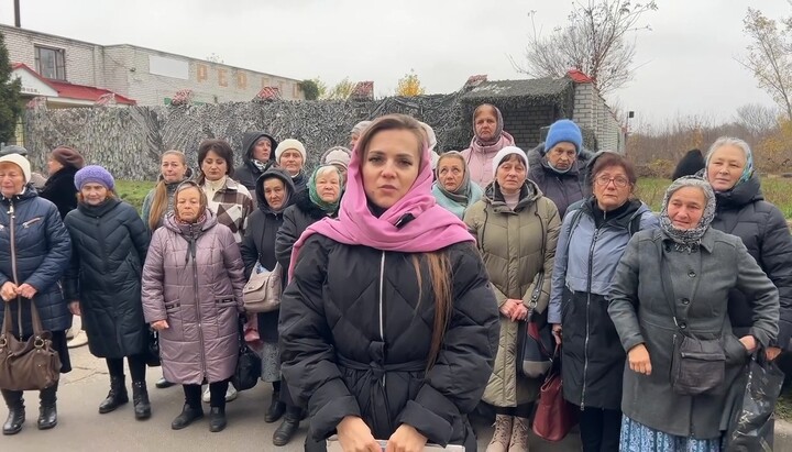 UOC parishioners outside the enlistment office. Photo: First Cossack