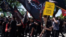 Thousands of Muslims march in the US to mark Islamic holiday