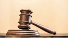 A Jehovah's Witnesses elder was tried for refusing to bear arms