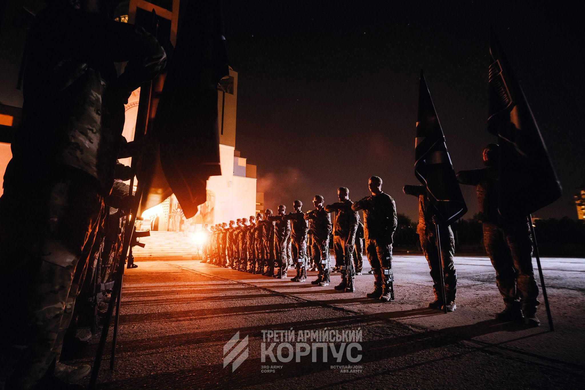 The coffin bearing Konovalets is carried into the UGCC cathedral after the night ceremony, Kyiv, August 2026.